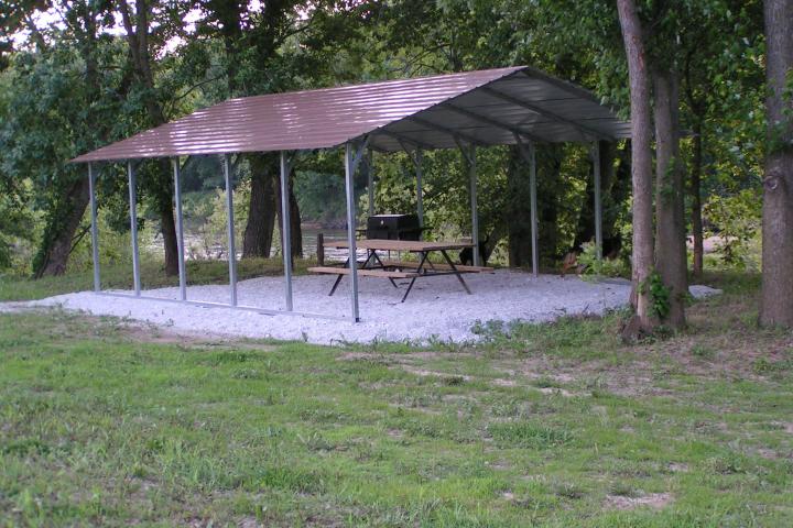 Pavillon with picnic table and grill