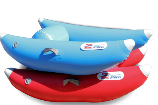Two inflatable blue and red kayaks stacked together.